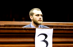 Son who slaughtered rich S.African family with axe handed 3 life terms