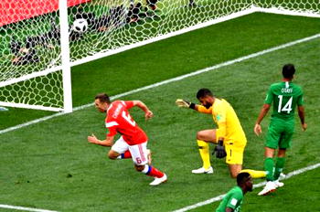 Flag-waving fans party as Russia wins World Cup opener in Moscow
