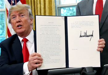 Trump signs executive order to end family separations at border