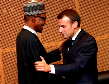 Photos : President Buhari, French President Macron at the AU summit