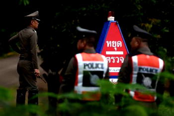 Eight rescued from Thai cave, but five remain trapped
