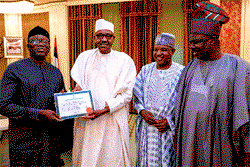 Photo: Fayemi presents certificate to president Buhari