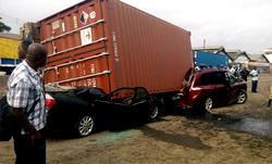 Two escape death as container falls on two cars at Apapa