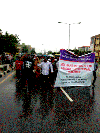 NASS siege: protesters in Lagos defy rain to demand probe