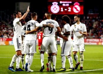 Bale and Benzema in the goals as Real Madrid survive scare