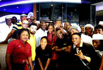 Ambode takes photos with Ikeja Mall staff after a quick lunch