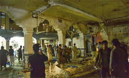 Bombers disguised as women hit Shiite mosque, at least 29 killed