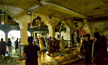 Bombers disguised as women hit Shiite mosque, at least 29 killed