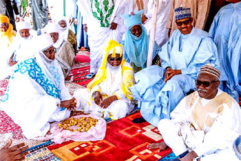 Photos: Buhari prayed, trekked in Daura