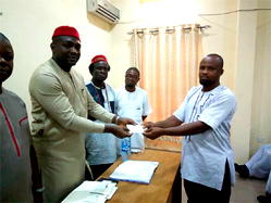 Hon. Emeneka doles out Cheques to 70 Students