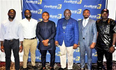 Adesola Adeduntan, Managing Director/Chief Executive Officer, First Bank of Nigeria Limited (third right) flanked by some FirstBank customers, Ayo Daniyan (left), Mayowa Daniyan (second left), Onyejekwe Nnaemeka (third left), Nicholas Okonkwo (second right) and Safiyanu Faisa (right) at the FirstBank Voice of Customer held with the Retail Youth segment in Lagos recently.