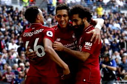 Liverpool cruise to victory at Watford to maintain pressure on Manchester City