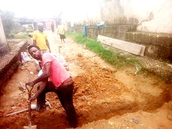 Residents run out of patience, patch potholes on Calabar streets
