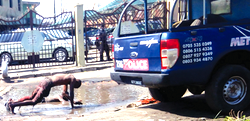 Photo: Stubborn truckers taking disciplinary muddy bathe