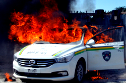 Police car burnt in Shi’ite protest; 400 arrested