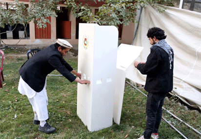 Explosions rock polling centres