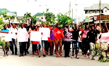 Delta villagers protest, give Catholic Church 2-week ultimatum to quit land