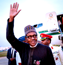 Photos: Buhari returns to Abuja