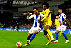 Hazard keeps Chelsea in title hunt at Brighton