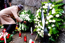 Photos: Buhari pays tribute to holocaust victims in Poland