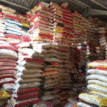 Workers, distributor protest seizure of 704 bags of local rice by Customs