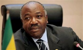 After months abroad, Gabon’s Bongo swears in new gov’t
