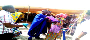 Day Ashimolowo fed, clothed, doled out N12million to 12,000 widows in Osun