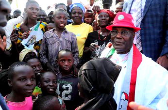 Emotional moment when orphans, IDPs hugged Atiku in Plateau