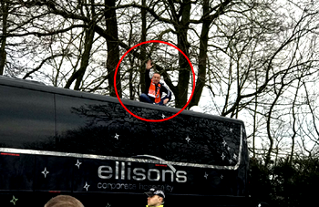 Blackpool fan stages 40-minute protest – on roof of Arsenal bus