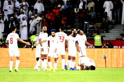 Hosts UAE stir from slumber, stumbling Syria sack Stange