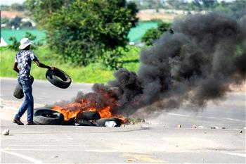 Zimbabwean protesters burn tyres, block roads over fuel price hike