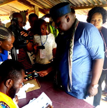 Okorocha, wife cast vote,  predicts Buhari’s victory