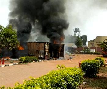 Photos: INEC card readers on fire in Anambra, officials flee