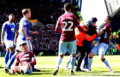 Pitch invader punches player in Aston Villa’s derby win at Birmingham