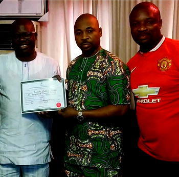 Photos: Dawodu, Rep-elect presents his Certificate of Return to MC Oluomo