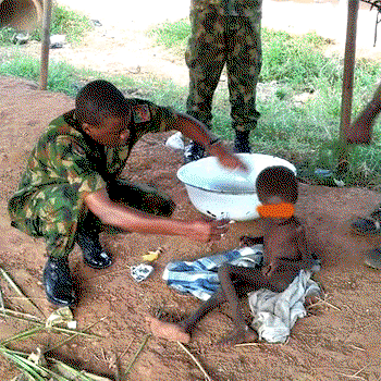 Photos: Nigerian soldier rescues little child from Boko Haram