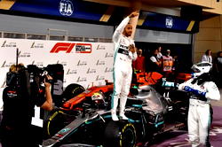 Victorious Hamilton defends rival Vettel
