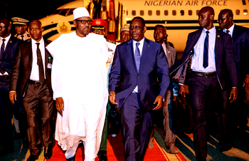 Photos Buhari arrives Dakar in Senegal