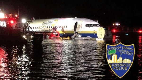 Boeing 737 plane skids off runway into water