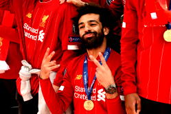 Liverpool stay top with club record-breaking win at Burnley