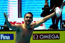 Milak crushes Phelps record to win world 200m butterfly gold