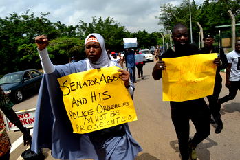 Photos: Protest against Senator Abbo in Abuja