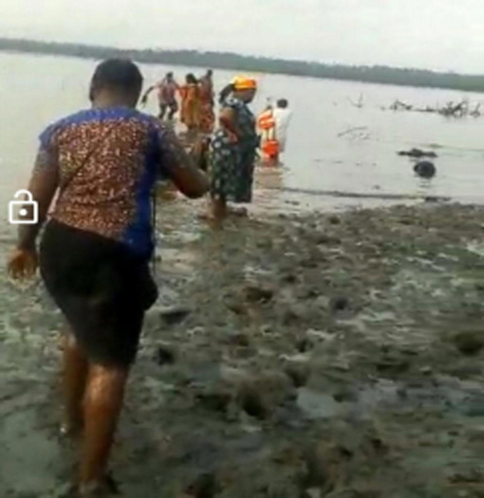 Survivors of the attacks looking for way out of the mangroves, and (below) Bille chiefs during a briefing in Port Harcourt.