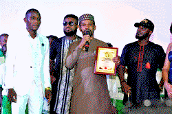 Top Abuja blogger wins award, dedicates to Regina Daniels Foundation