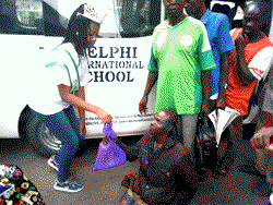 10 year old queen Mmesoma puts smile on poor people’s faces