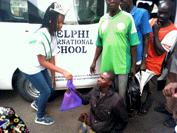 10 year old queen Mmesoma puts smile on poor people’s faces