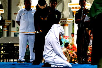Couples whipped for public display of affection in Indonesia