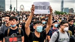 Hong Kong protesters, police face off in renewed clashes