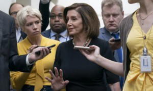 Nancy Pelosi on Capitol Hill on Wednesday. Democrats recognize that the forthcoming impeachment battle will be waged far from the halls of Congress. PHOTO: J Scott Applewhite/AP