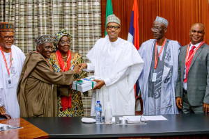 PHOTOS:President Buhari receives Annual Report of Police Service Commission in State House